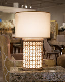 This sleek silver lamp brings a modern flair to any living room, combining style and illumination to elevate contemporary interiors.