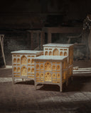Model of our shalimar table with illuminated windows on a textured surface