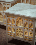 Decorative table with intricate carvings and marble top