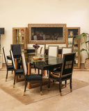 The Taurus Dining Set, elegantly presented in a refined setting, highlights the exceptional craftsmanship of handmade furniture from Lahore, Pakistan