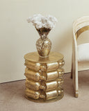 Close-up of the Bottle side table, highlighting its sculptural base and smooth, modern finish.