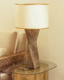 Elegant lamp beside the bed, adding warmth and charm to the room, made in Lahore.


