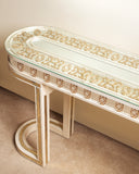 A close look of the top of the venetian mosaic console. 
