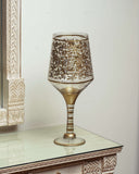 This handcrafted Elegant Vine Glass enhances the sophistication of a refined living space with its graceful design and artisanal quality.
