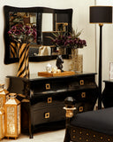 Black Swan Bed Set with dresser in frame, styled with soft neutral décor.

